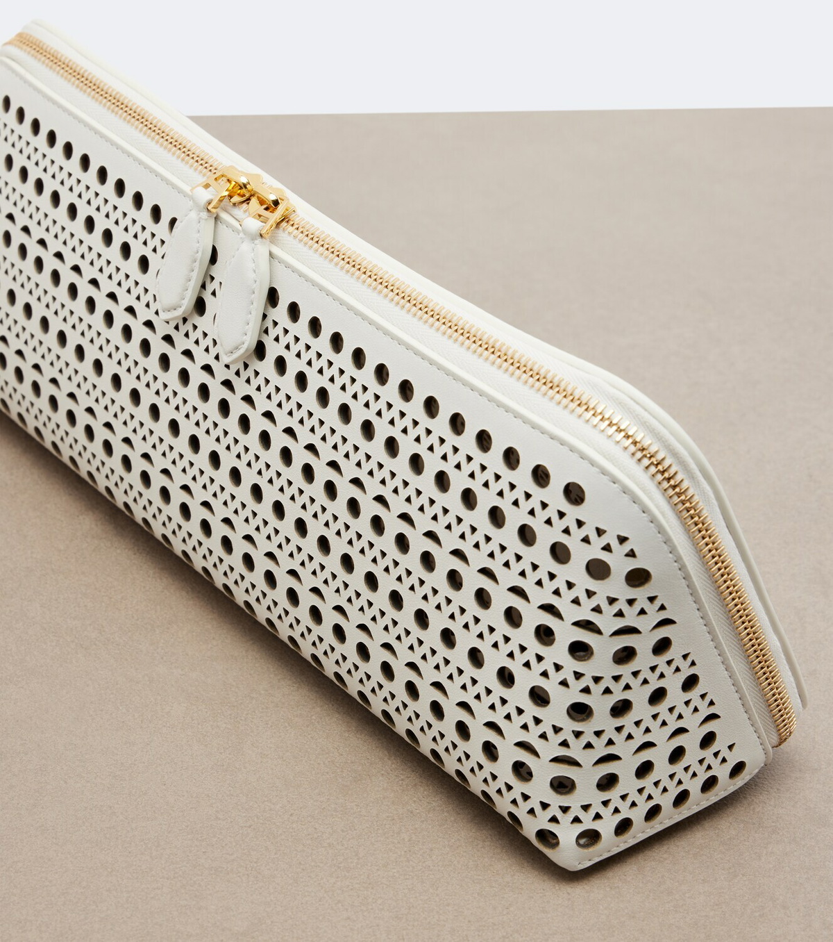 Alaïa Delta Small leather clutch