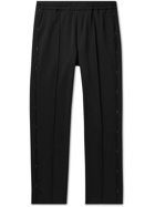 MCQ - Tapered Logo-Appliquéd Pintucked Stretch-Jersey Sweatpants - Black