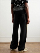 AMIRI - Wide-Leg Logo-Flocked Cotton-Jersey Sweatpants - Black