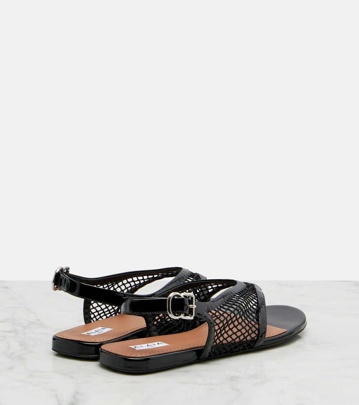 Alaïa Fishnet leather-trimmed thong sandals