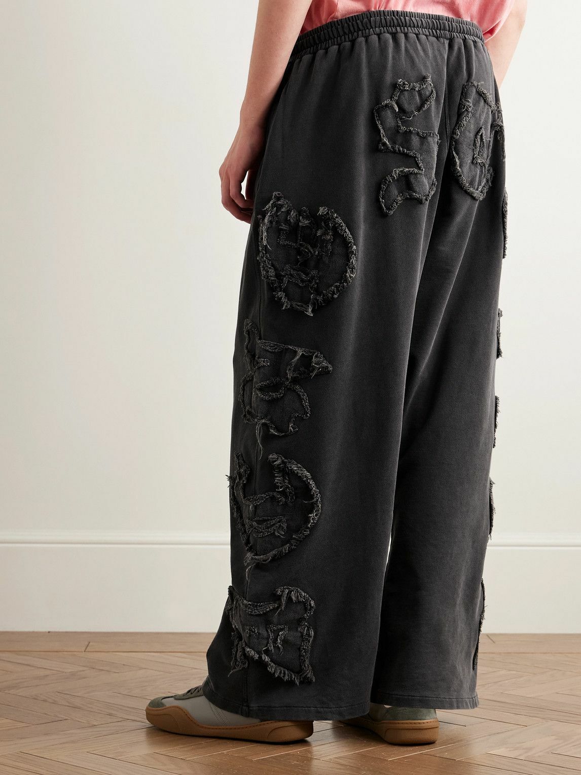 Acne Studios - Prowser Wide-Leg Distressed Appliquéd Cotton-Jersey Sweatpants - Black
