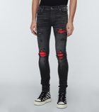 Amiri MX1 distressed skinny jeans