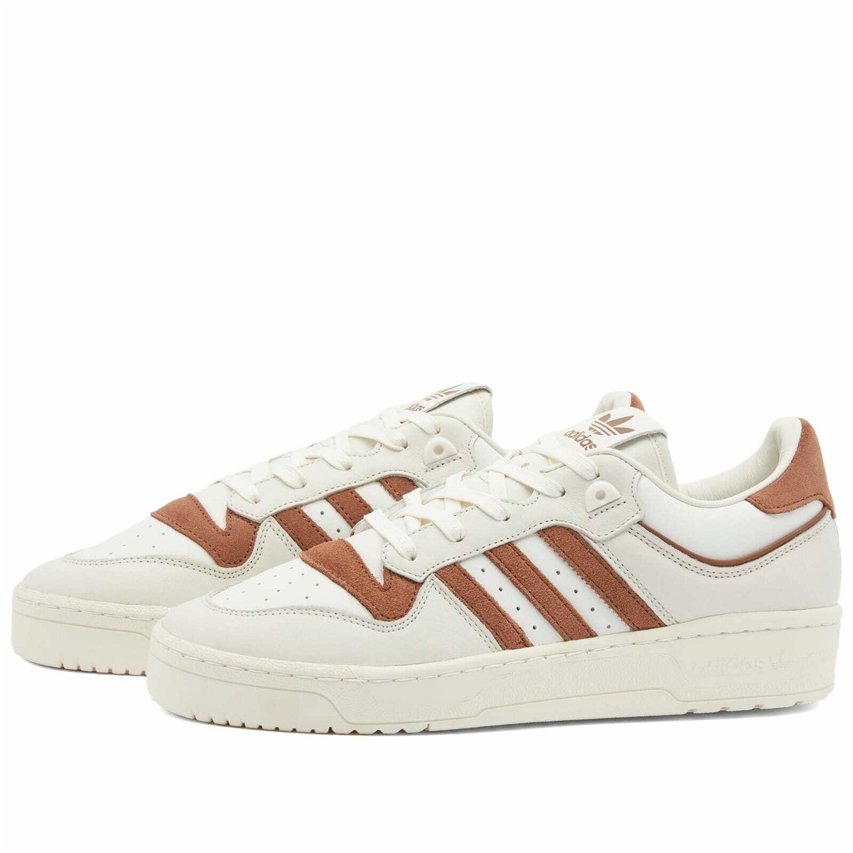 Photo: Adidas Men's Rivalry 86 Low Sneakers in Cloud White/Preloved Brown/Off White