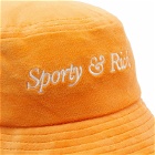 Sporty & Rich Italic Logo Velour Bucket Hat in Peach/White
