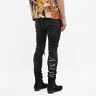 AMIRI Men's Watercolor Logo Jean in Aged Black