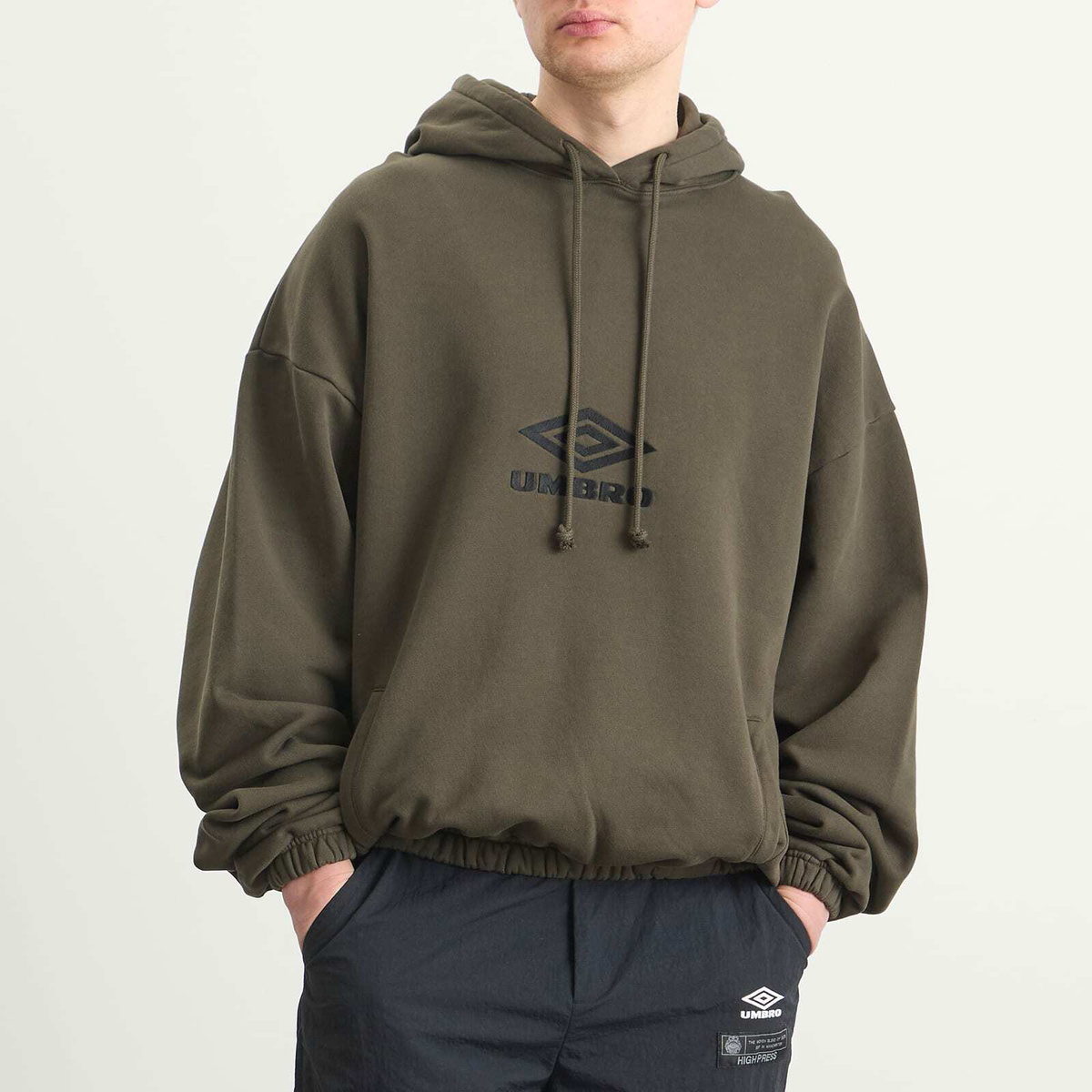 Umbro by Slam Jam Men's OG Logo Mask Hoodie in Dark Olive
