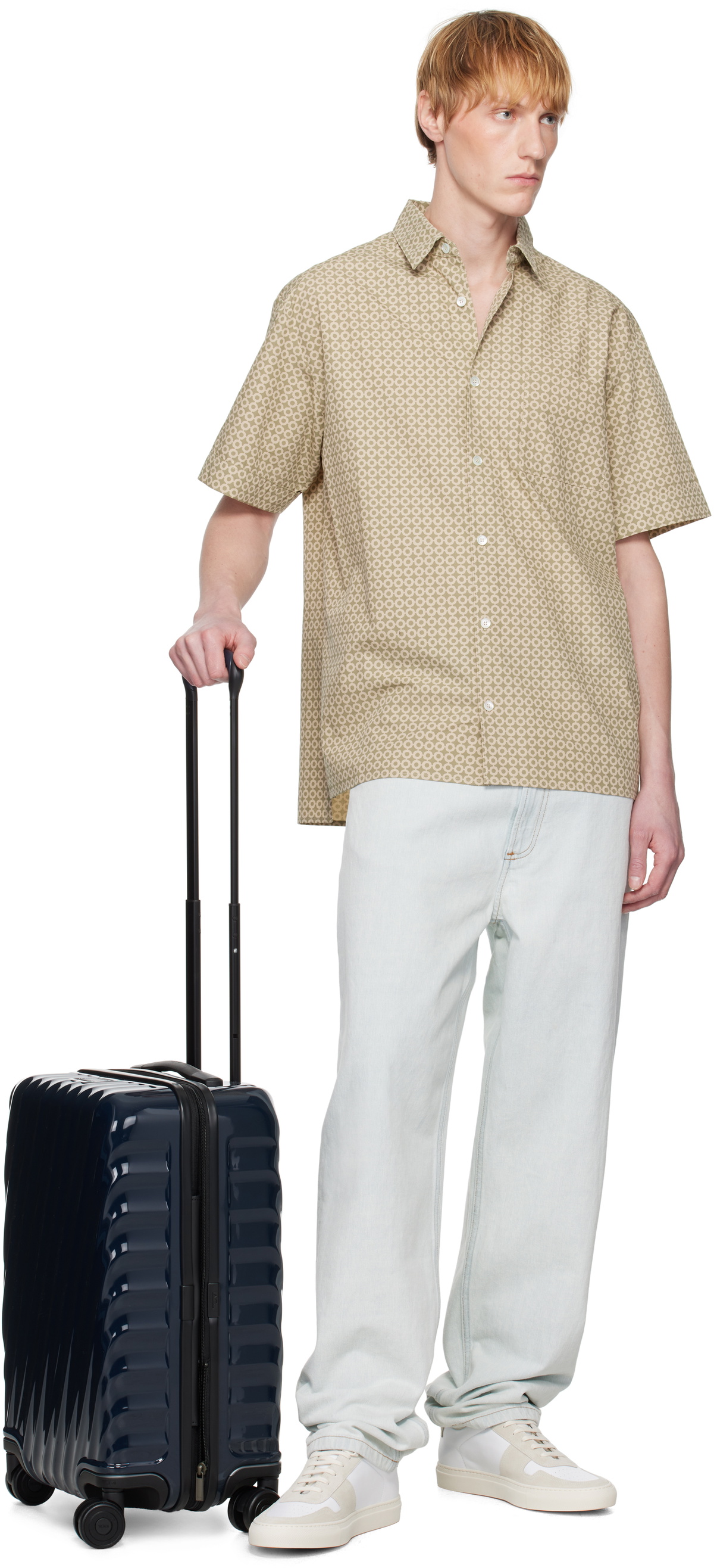 Tumi Navy International Expandable 4 Wheeled Carry-On Suitcase