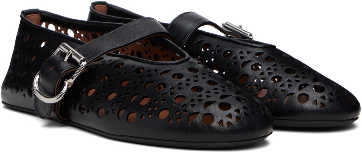 ALAIA VIENNE FLAT MULES IN GOLDEN LAMBSKIN
