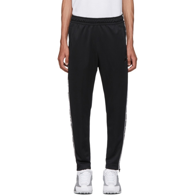 Photo: Nike Black Swoosh Tape Track Pants