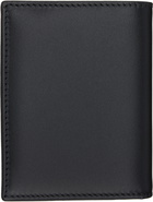 COMME des GARÇONS WALLETS Black Eyelet Wallet
