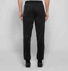 Givenchy - Tapered Logo-Jacquard Fleece-Lined Tech-Jersey Sweatpants - Men - Black