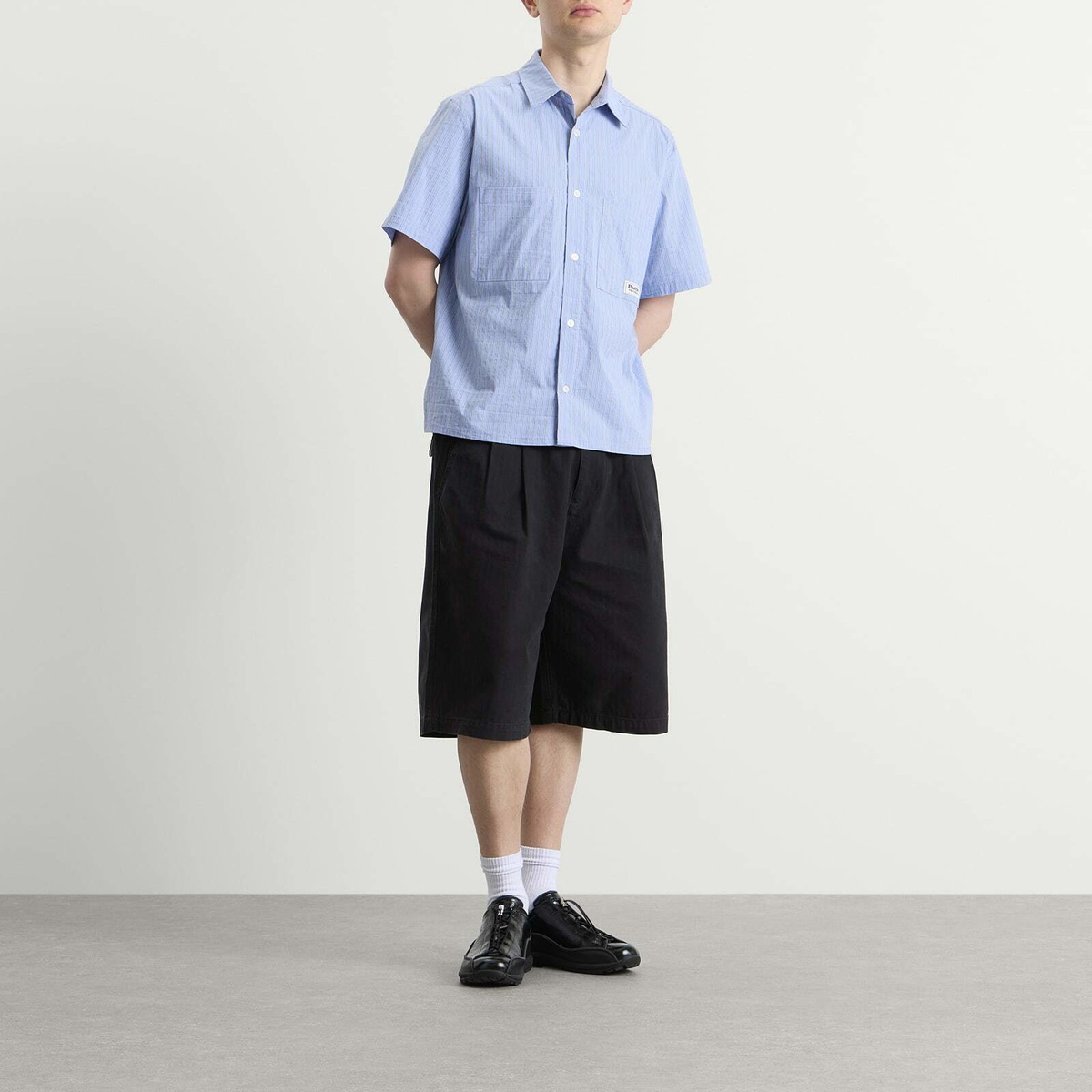 Butter Goods Men's Pleated Shorts in Washed Black