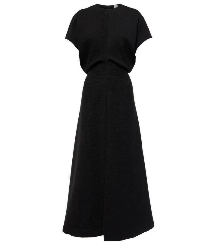 Photo: Toteme Slouch midi dress