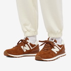 New Balance Women's WL574NA Sneakers in True Brown