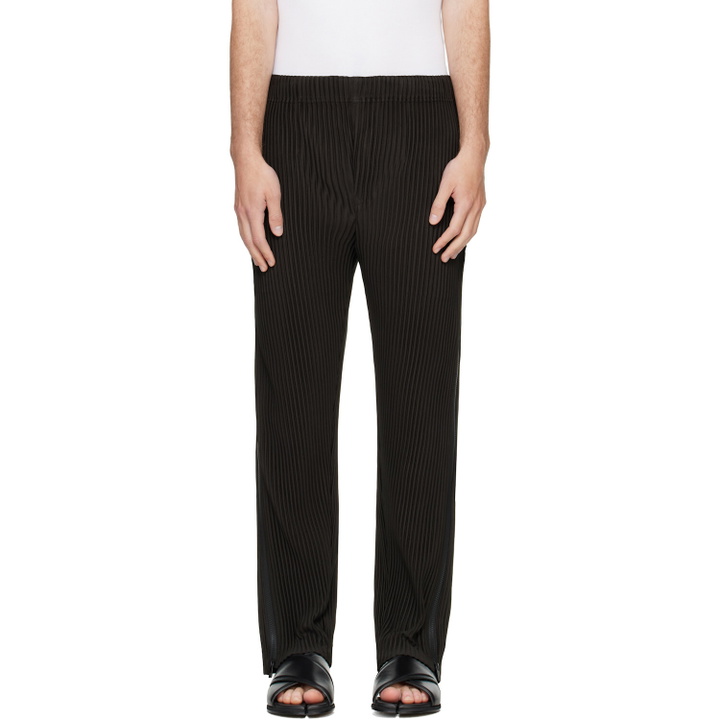 Photo: HOMME PLISSÉ ISSEY MIYAKE Black Multi-Fastened Trousers