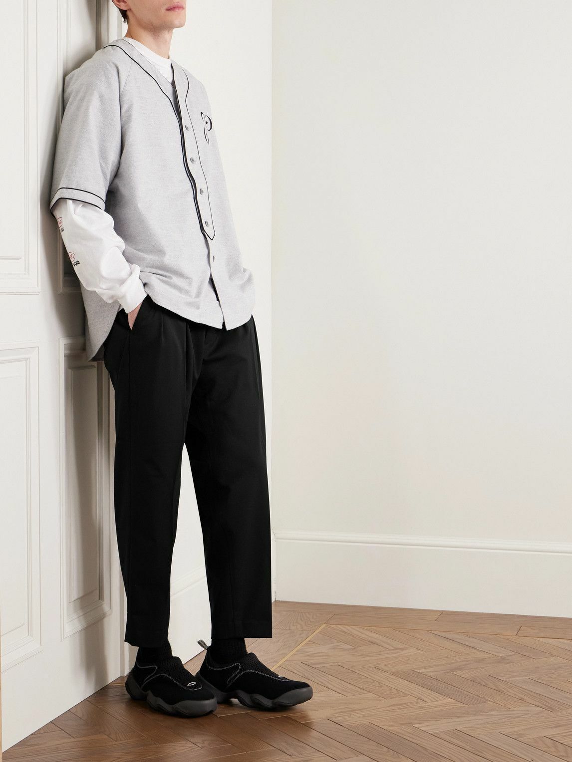 WTAPS - Cropped Tapered Logo-Appliquéd Pleated Twill Trousers - Black