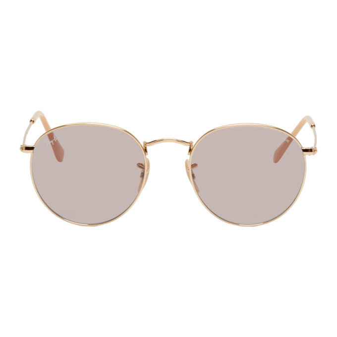 Photo: Ray-Ban Gold and Grey Round Phantos Sunglasses