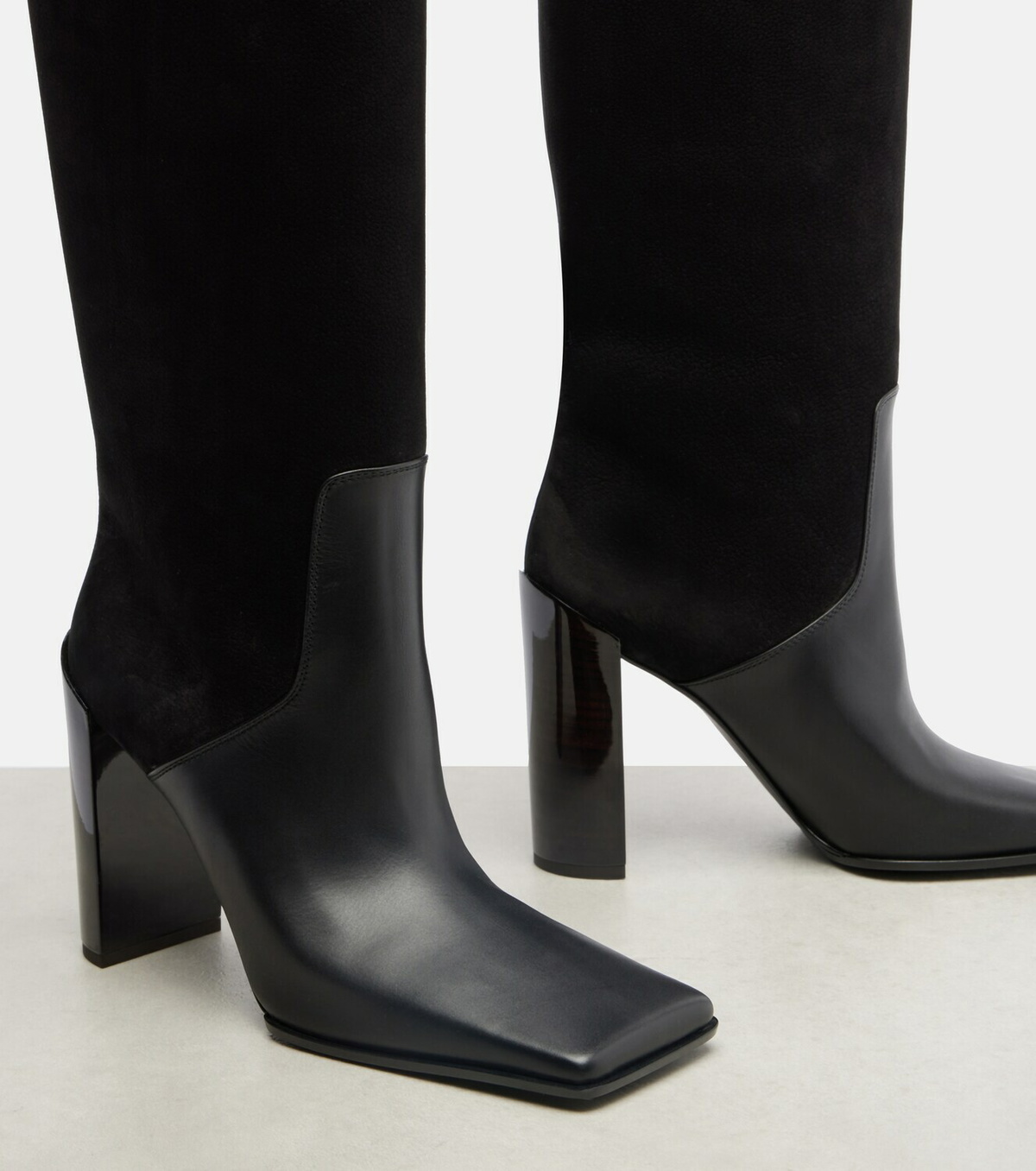 Alaïa 90 leather and suede knee-high boots