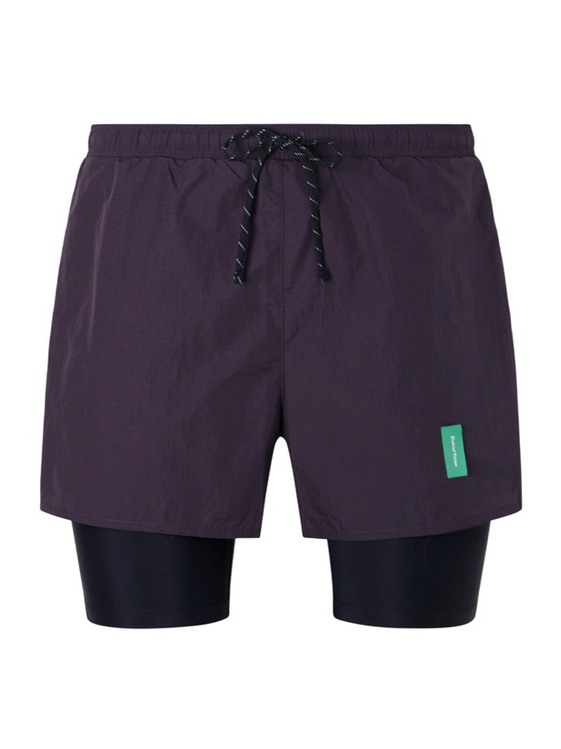 Photo: DISTRICT VISION - Ultralight Shell Running Shorts - Purple