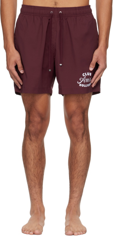Photo: AMIRI Burgundy 'Club Amiri' Swim Shorts