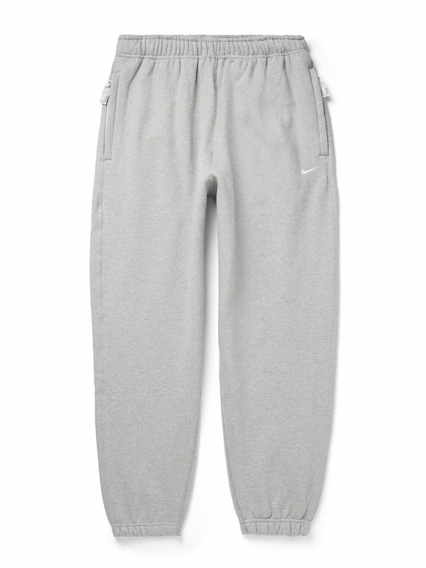 Photo: Nike - Solo Swoosh Tapered Logo-Embroidered Cotton-Blend Jersey Sweatpants - Gray