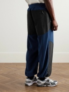 Nike - ACG Wolf Tree Panelled Polartec® Fleece and Nylon Sweatpants - Blue