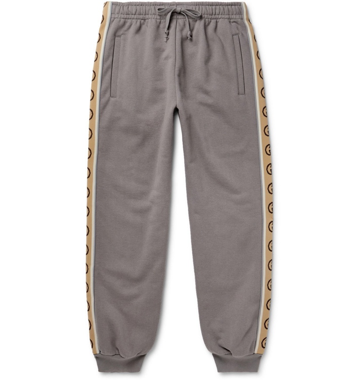 Photo: Gucci - Tapered Logo-Jacquard Webbing-Trimmed Loopback Cotton-Jersey Sweatpants - Gray