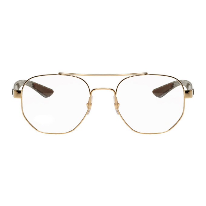 Photo: Ray-Ban Gold RB8418 Aviator Glasses