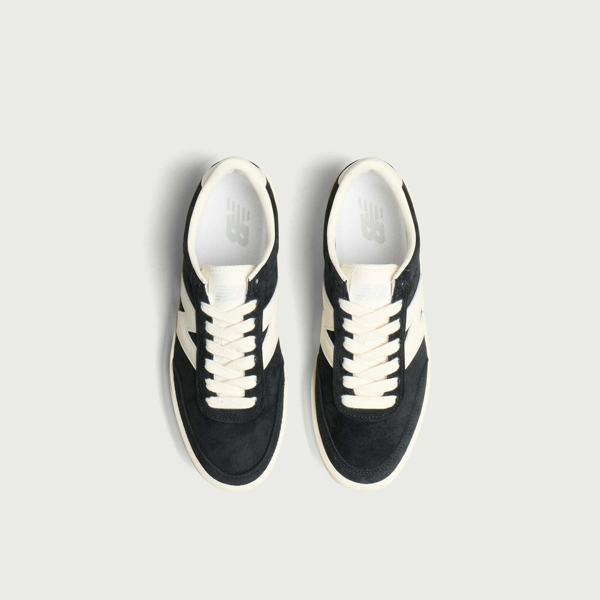 New Balance Men's 750 Sneaker in Black/Angora
