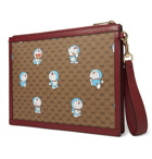 GUCCI - Doraemon Leather-Trimmed Printed Monogrammed Coated-Canvas Pouch - Brown
