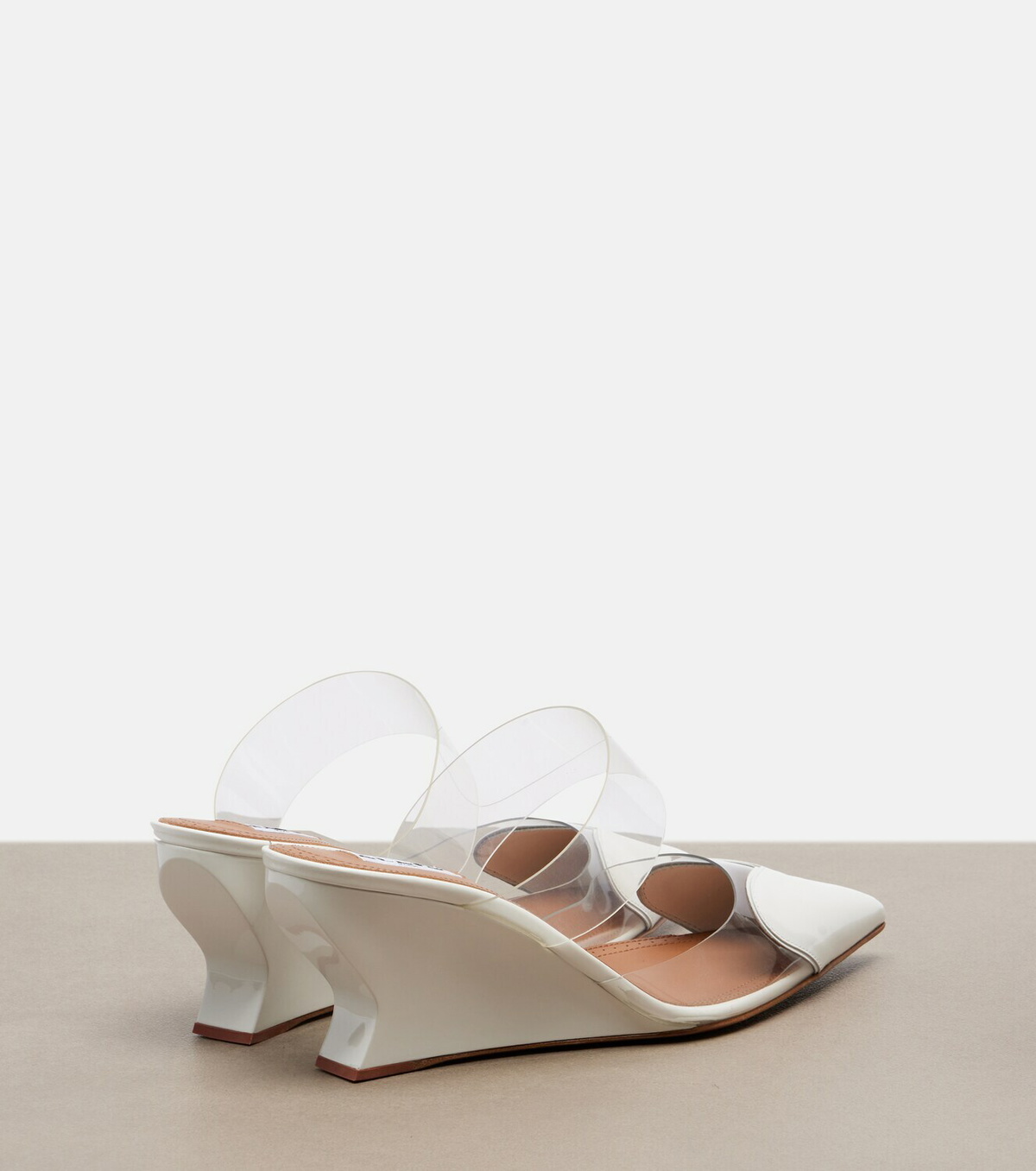 Alaïa Le Coeur patent leather wedge mules