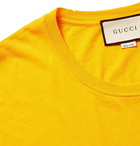 Gucci - Distressed Logo-Print Cotton-Jersey T-Shirt - Men - Marigold