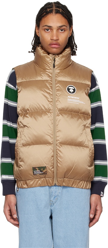 Photo: AAPE by A Bathing Ape Gold Printed Down Vest