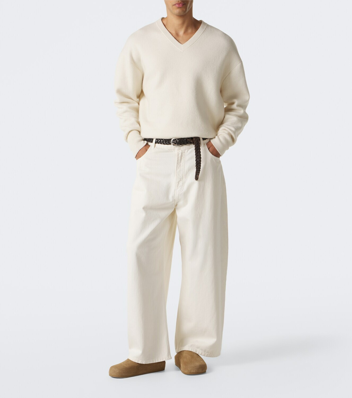 Studio Nicholson Wearing suede mules