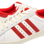Adidas Men's Superstar 82 Sneakers in Cloud White/Vivid Red