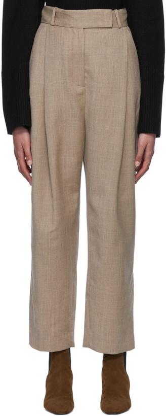 Photo: Totême Brown Pleated Trousers