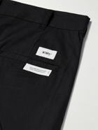 WTAPS - Tapered Logo-Appliquéd Cotton-Blend Trousers - Black