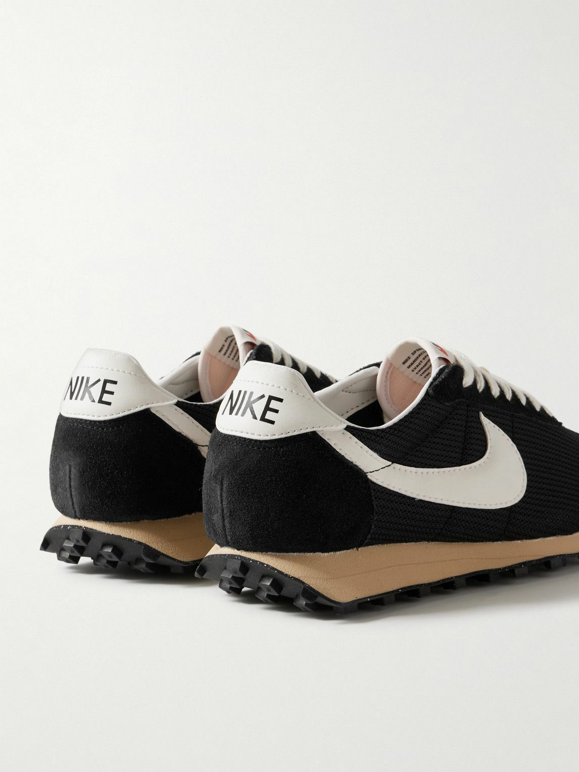 nike black and white mesh sneakers