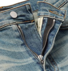 AMIRI - Thrasher Skinny-Fit Appliquéd Distressed Stretch-Denim Jeans - Men - Light denim