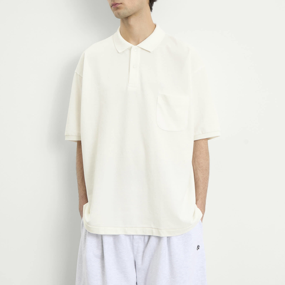 Nanamica Men's Snap Polo Shirt in Off White
