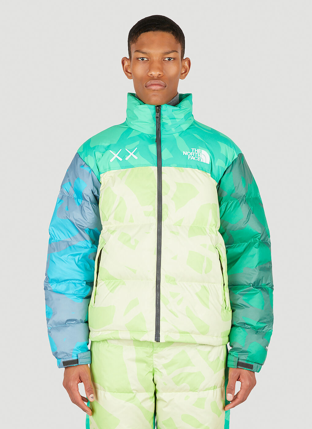 x KAWS 1996 Retro Nuptse Jacket in Green The North Face