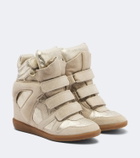 Isabel Marant Bekett metallic leather and suede wedge sneakers