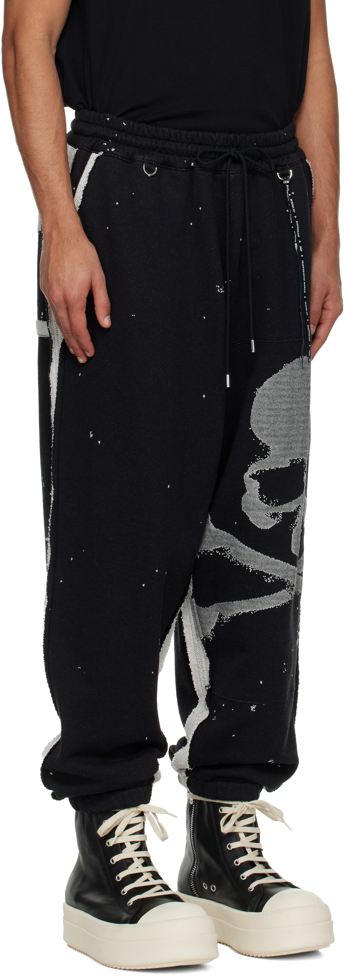 MASTERMIND WORLD Black Cut-Off Sweatpants