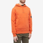 C.P. Company Men's Arm Lens Popover Hoody in Harvest Pumpkin