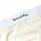 Sporty & Rich Women's Serif Logo Thong in Cream