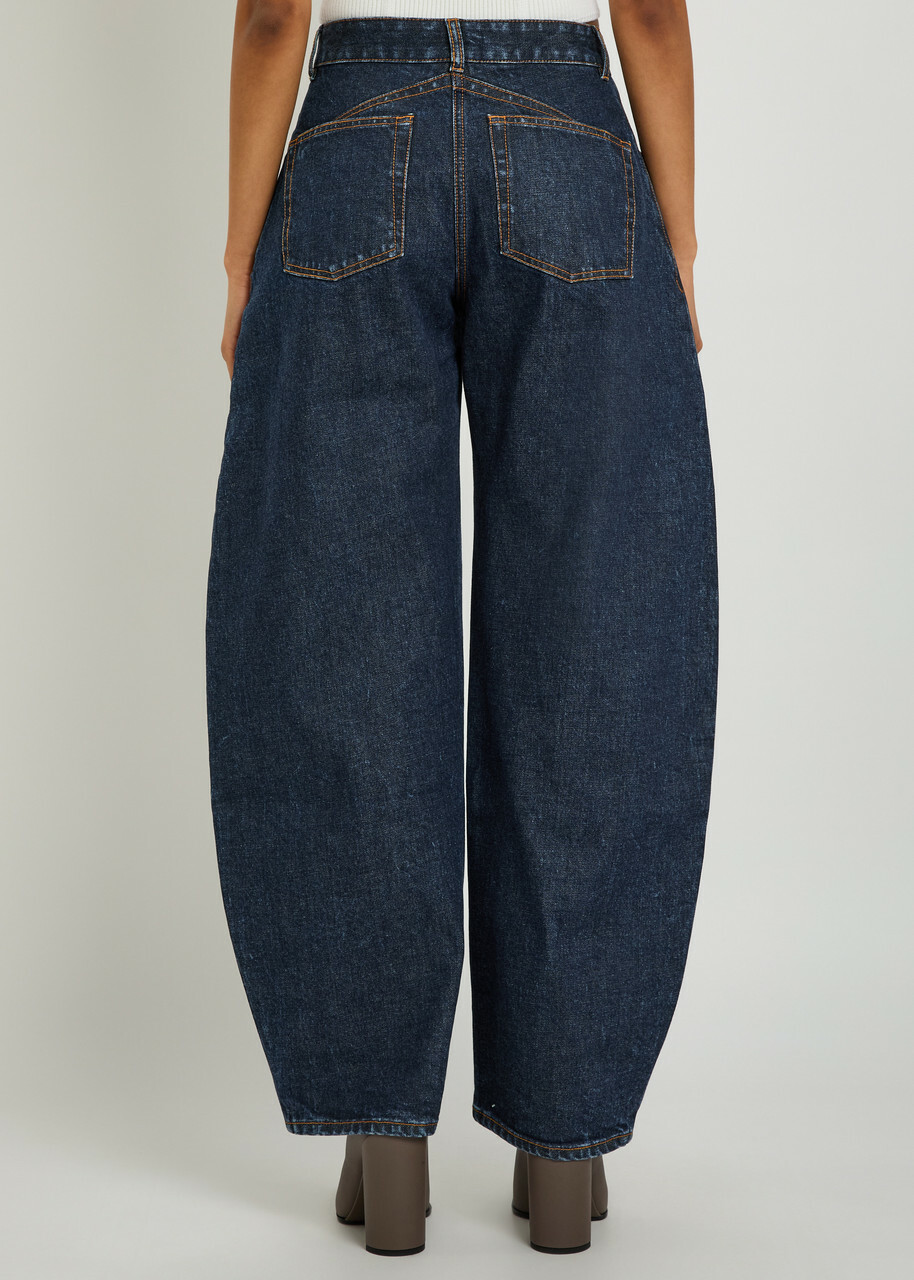 Alaïa Low Round Barrel-leg Denim Jeans