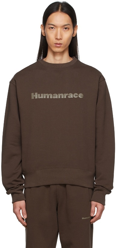 Photo: adidas x Humanrace by Pharrell Williams SSENSE Exclusive Brown Humanrace Tonal Logo Sweatshirt