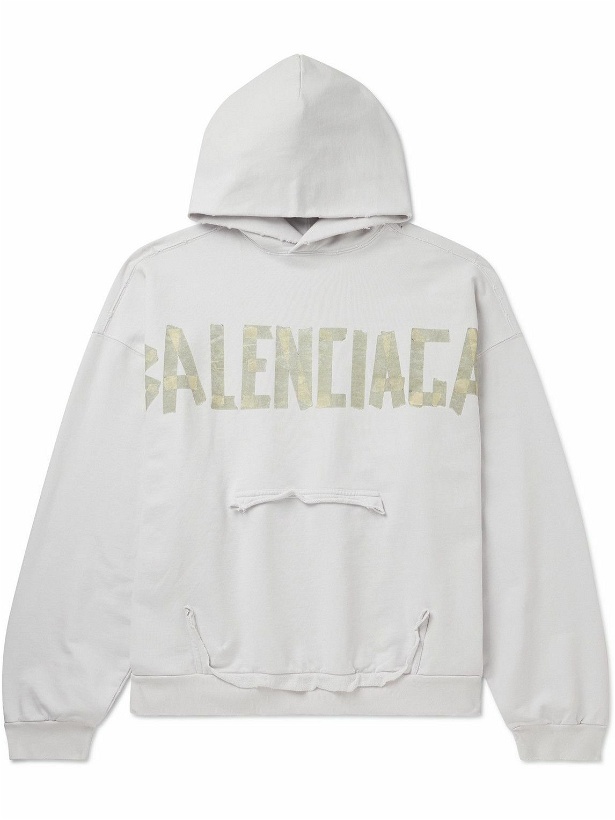 Photo: Balenciaga - Oversized Distressed Logo-Print Cotton-Jersey Hoodie - White