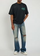 Amiri Slashed Distressed Bootcut Jeans Denim