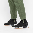 Adidas Men's NMD_R1 Primeblue Sneakers in Core Black/Gum